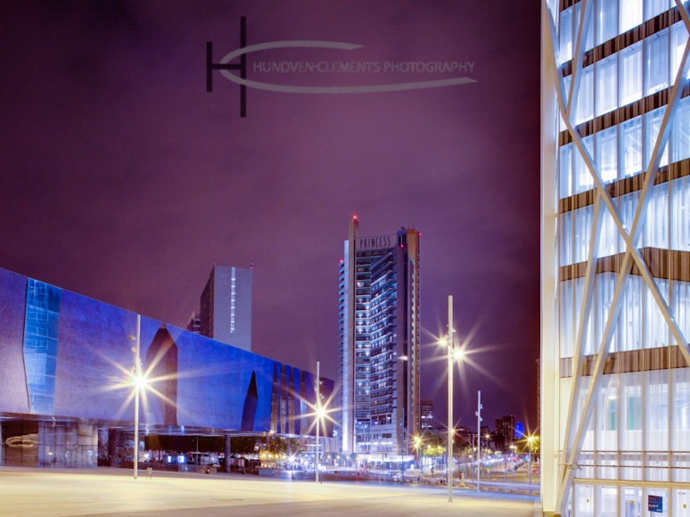 The Forum Building at night designed by Herzog & de Meuron.