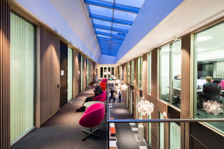 Large natural daylight roof makes the space feel less confined.