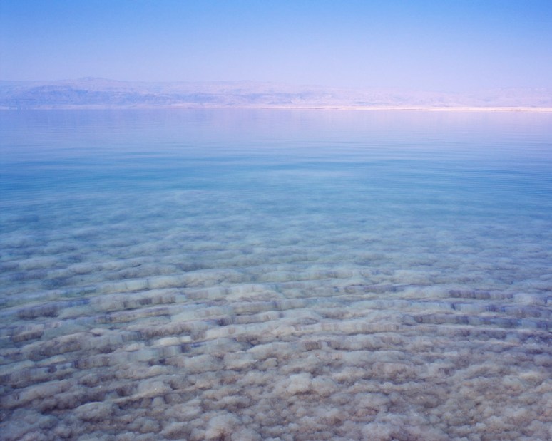 Ripples on the Dead Sea in Israel with Jordan on the horizon