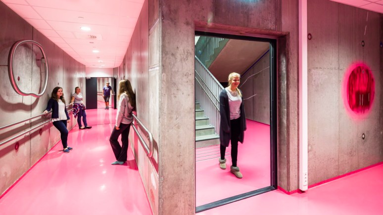 Students relaxing in the corridors of Bjoernsletta School, designed by L2 Arkitekter, Oslo, Norway.
