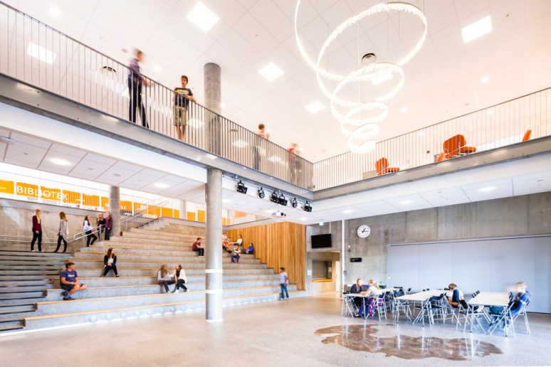 Students using the main atrium at Bjoernsletta School, designed by L2 Arkitekter, Oslo, Norway.