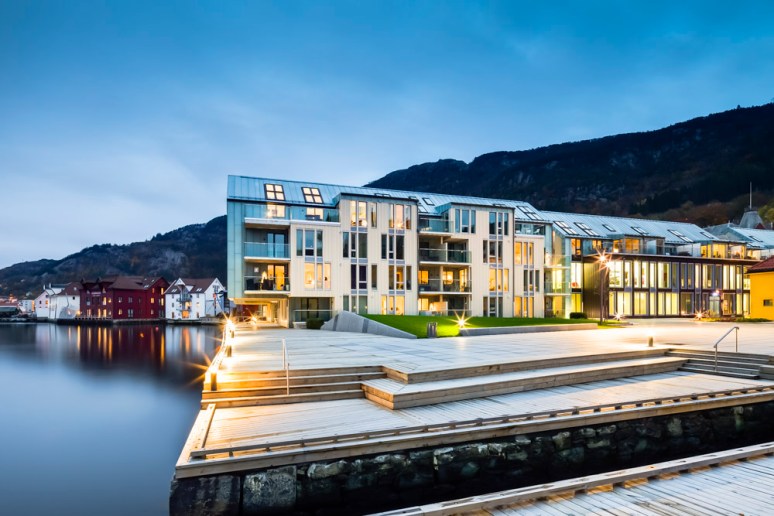 Overview at dusk of Price Waterhouse Coopers HQ designed by Ramboll, Bergen, Norway.