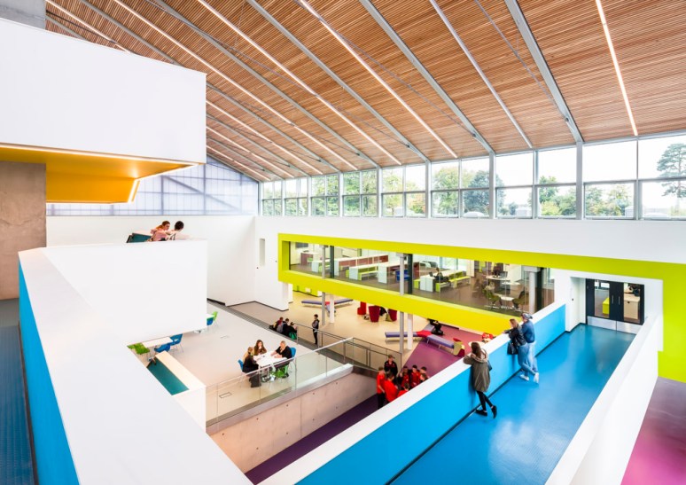 Blue stairs in the central hub area, North Hertforshire College designed by Scott Brownrigg, Hitchin, UK