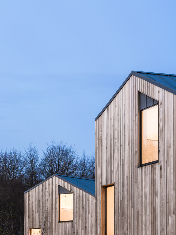 Graphic detail of two facades at The Woods residential property designed by Scott Brownrigg, Bedfordshire, UK.