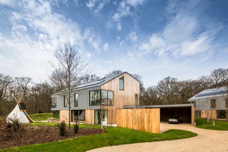 A house and tippee at The Woods residential property designed by Scott Brownrigg, Bedfordshire, UK.
